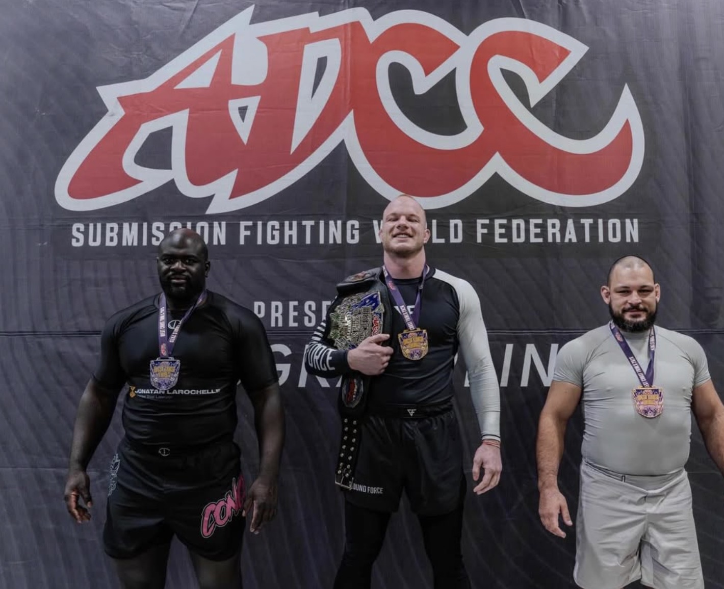 Nick Hartman on the ADCC podium with the championship belt